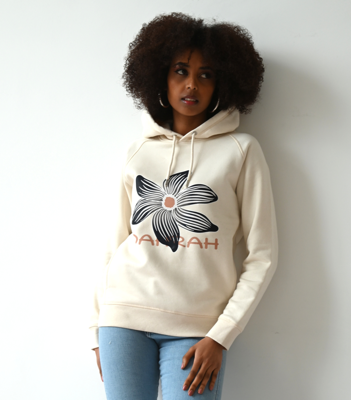 Beautiful high quality organic hoodie with print of a black flower by Dahrah Darah Fashion.