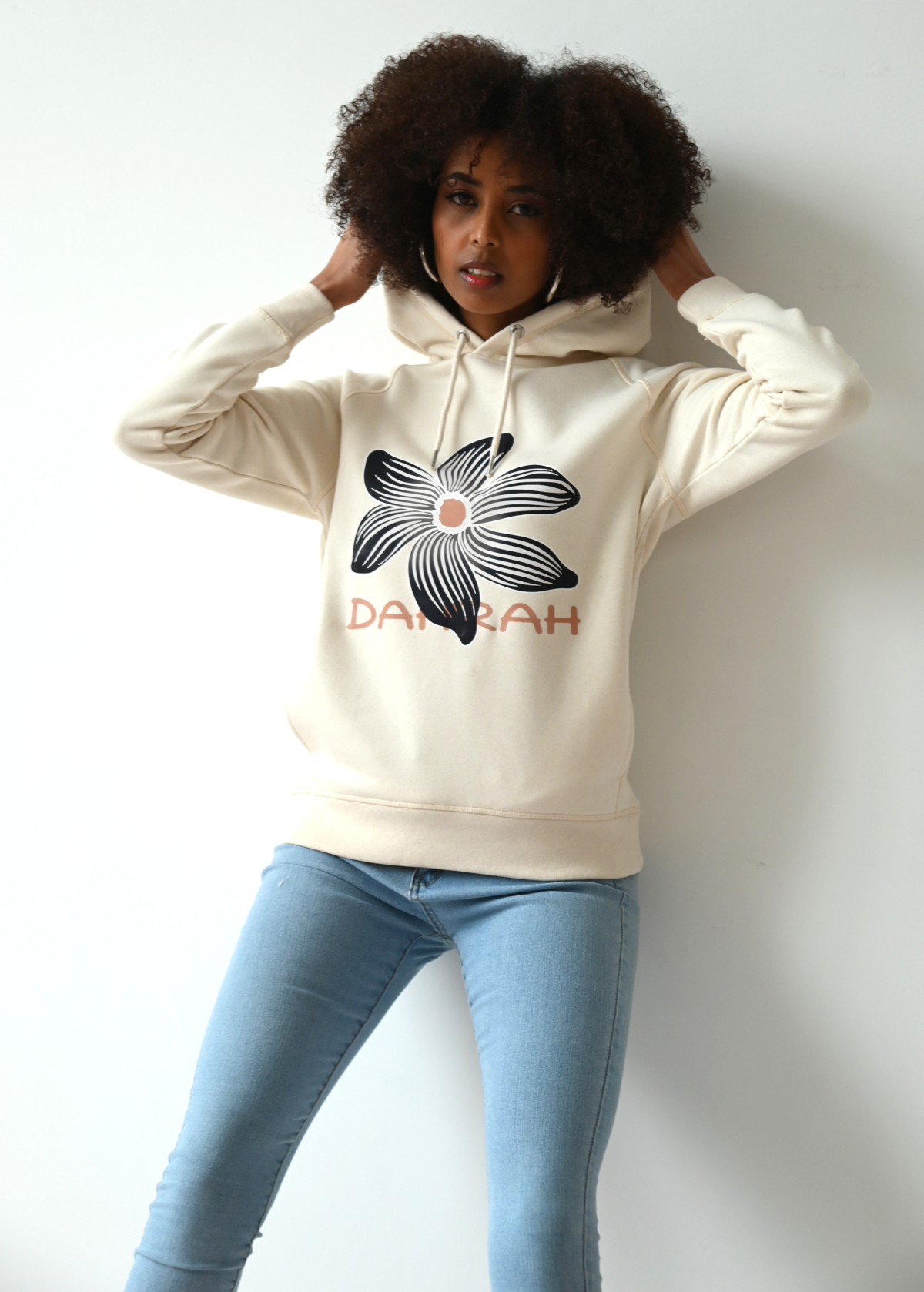 Beautiful high quality organic hoodie with print of a black flower by Dahrah Darah Fashion.