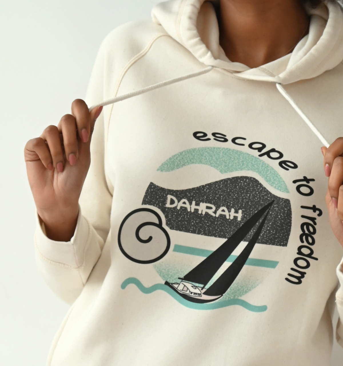 Beautiful high quality organic hoodie with print of a sailing boat by Dahrah Darah Fashion.