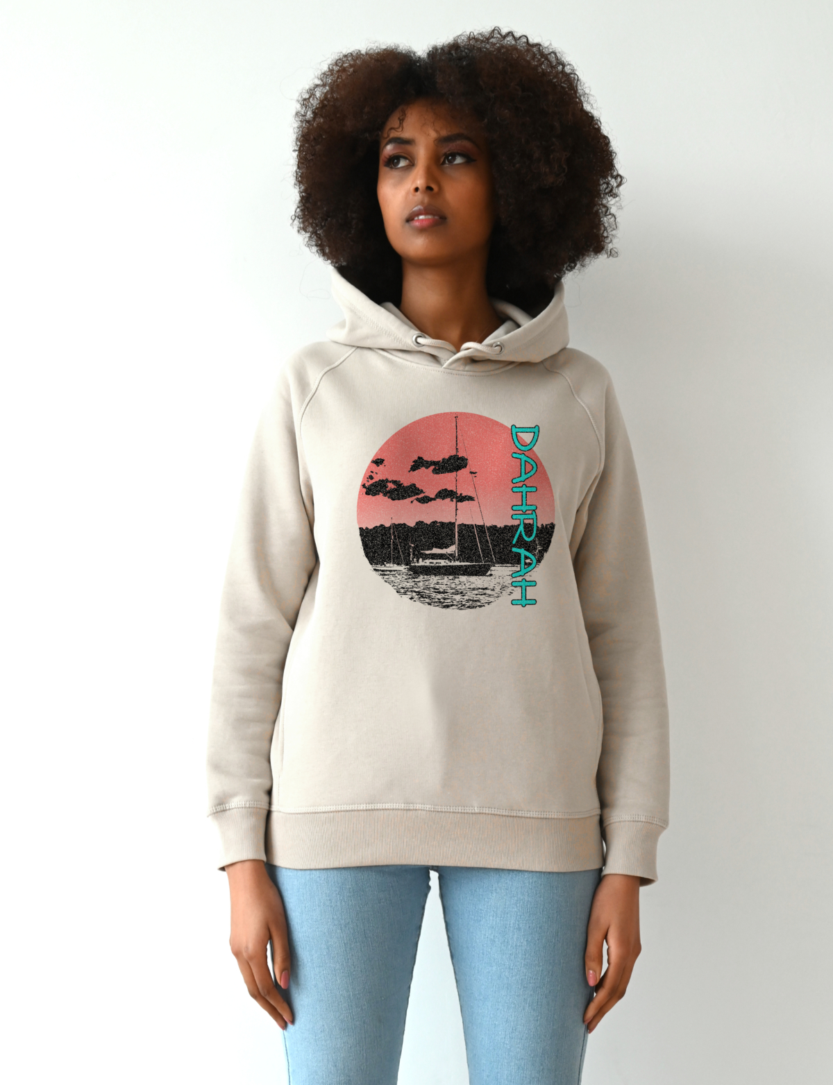 Dahrah Fashion unisex hoodie with print of a sailboat anchored at a beach.