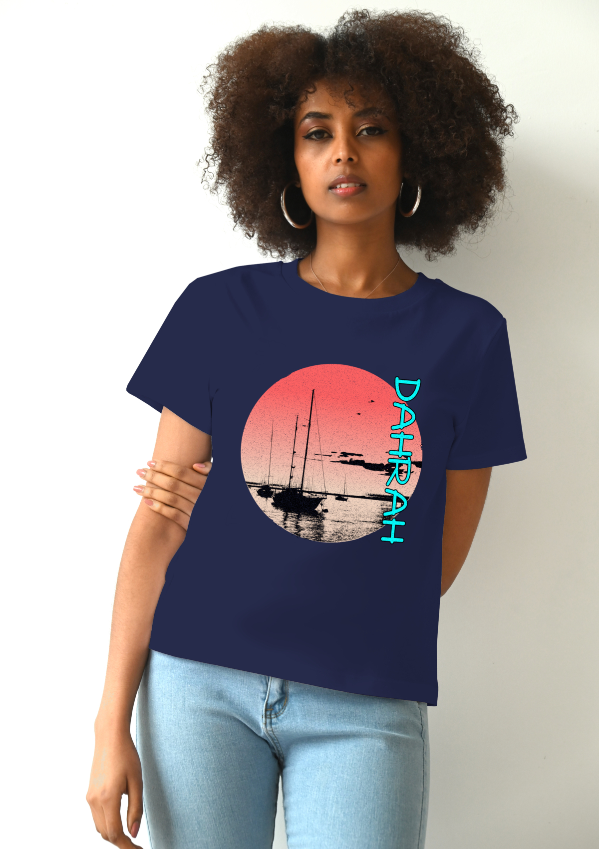 Dahrah Darah lady organic cotton T-shirt with print of a sailboats at anchorage.