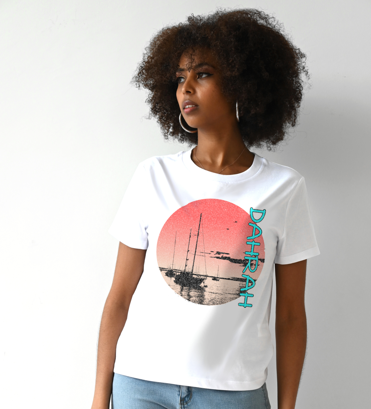 Dahrah Darah lady organic cotton T-shirt with print of a sailboats at anchorage.