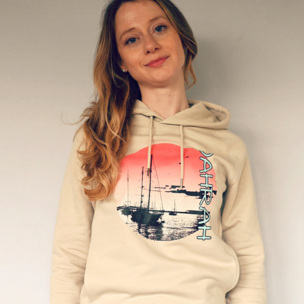 Dahrah Darah unisex organic hoodie with print of a sailboats at anchorage.
