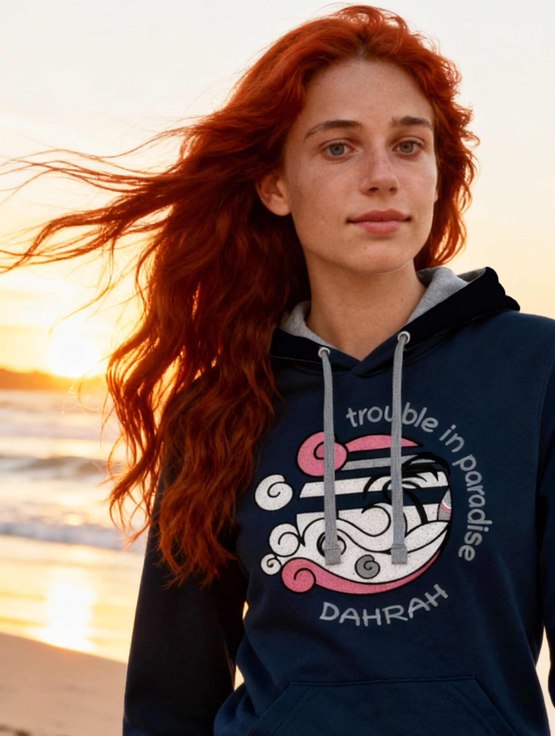 Dahrah surfing and sailing hoodie with print of surfing beach with shark.