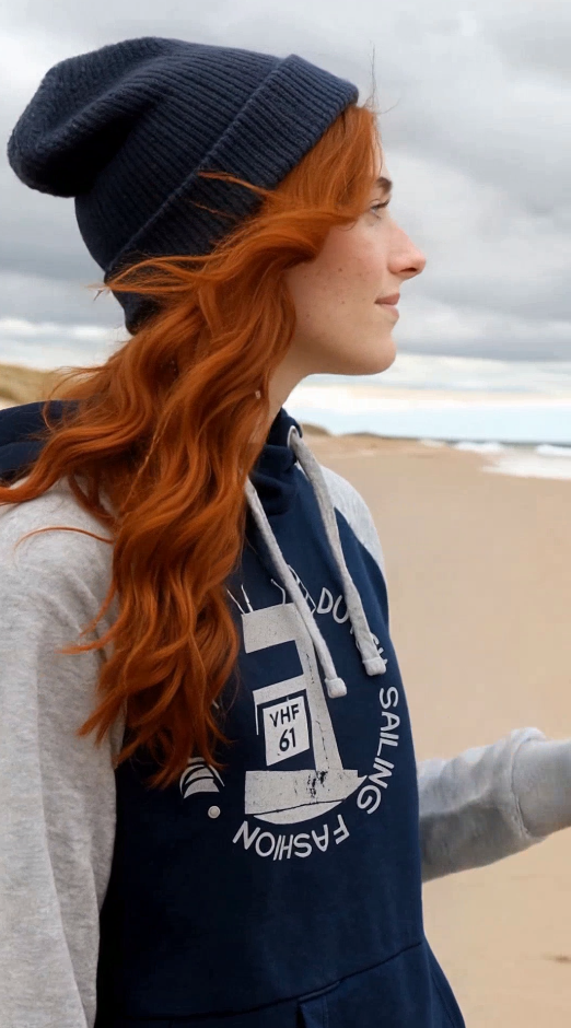 Sailing hoodie by Dahrah with print of a lighthouse, in grey and navy color and raglan sleeve. Great style for sailing, skippers and crews.