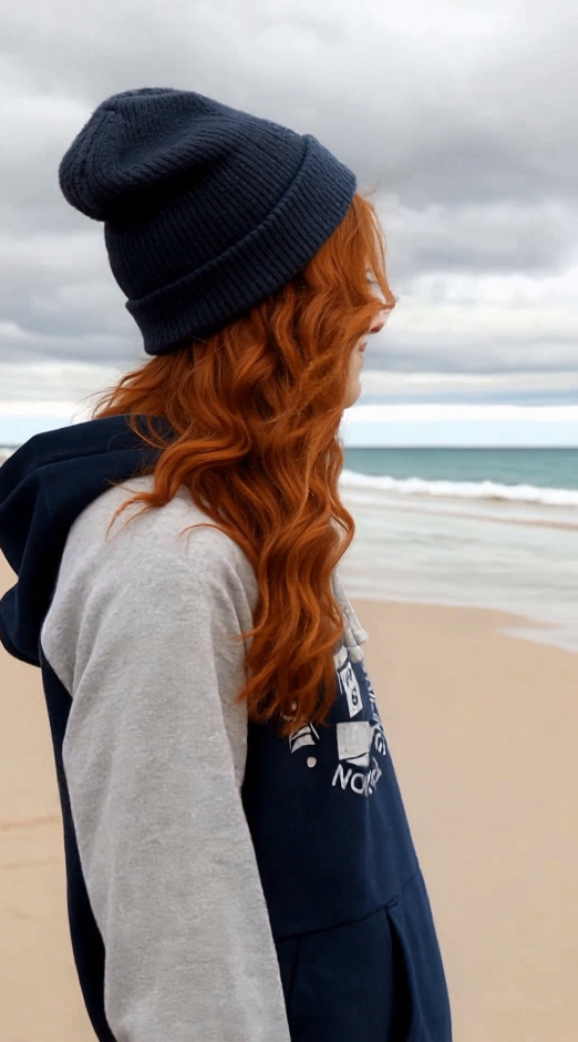 Sailing hoodie by Dahrah with print of a lighthouse, in grey and navy color and raglan sleeve. Great style for sailing, skippers and crews.