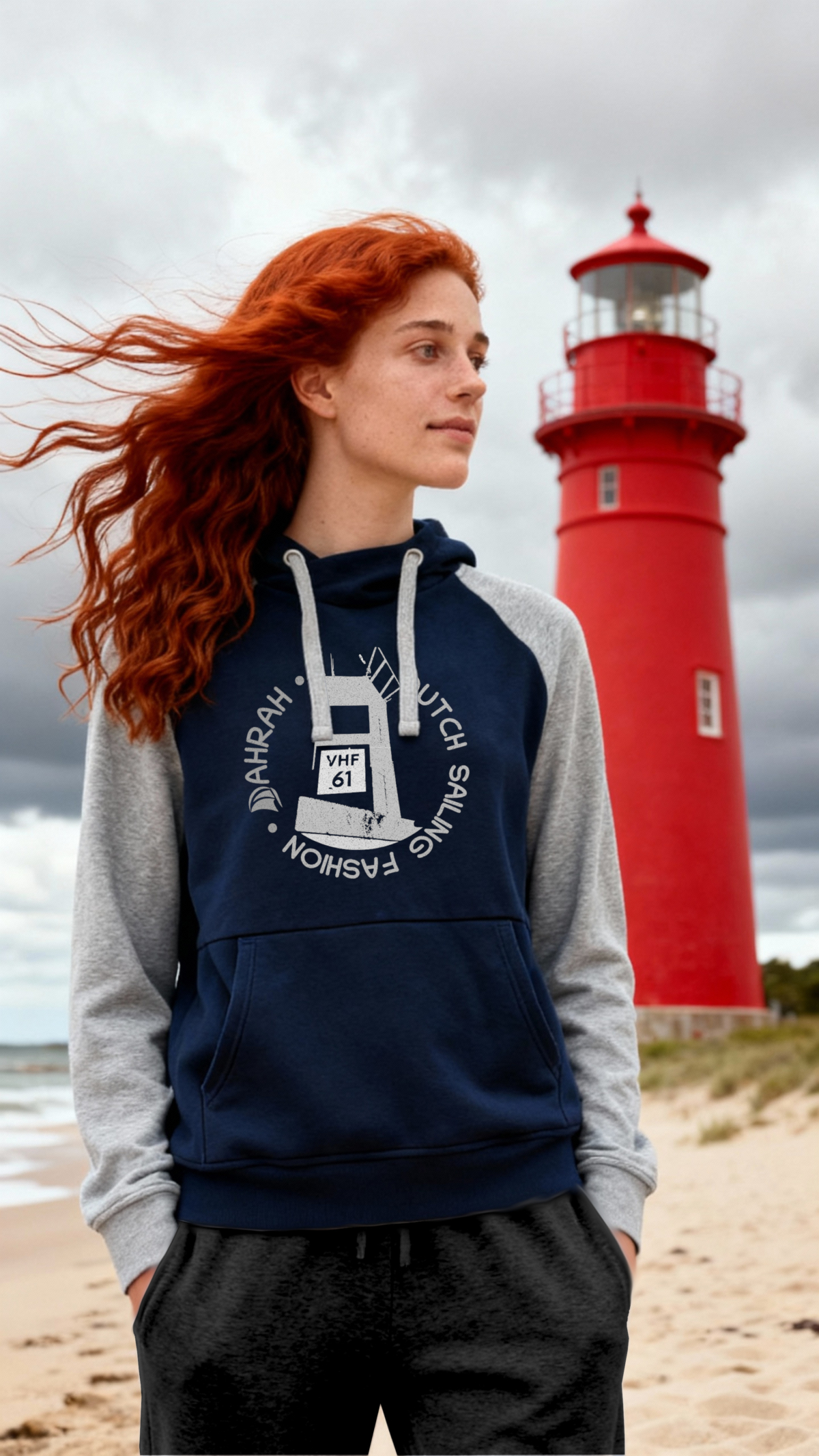 Sailing hoodie by Dahrah with print of a lighthouse, in grey and navy color and raglan sleeve. Great style for sailing, skippers and crews.