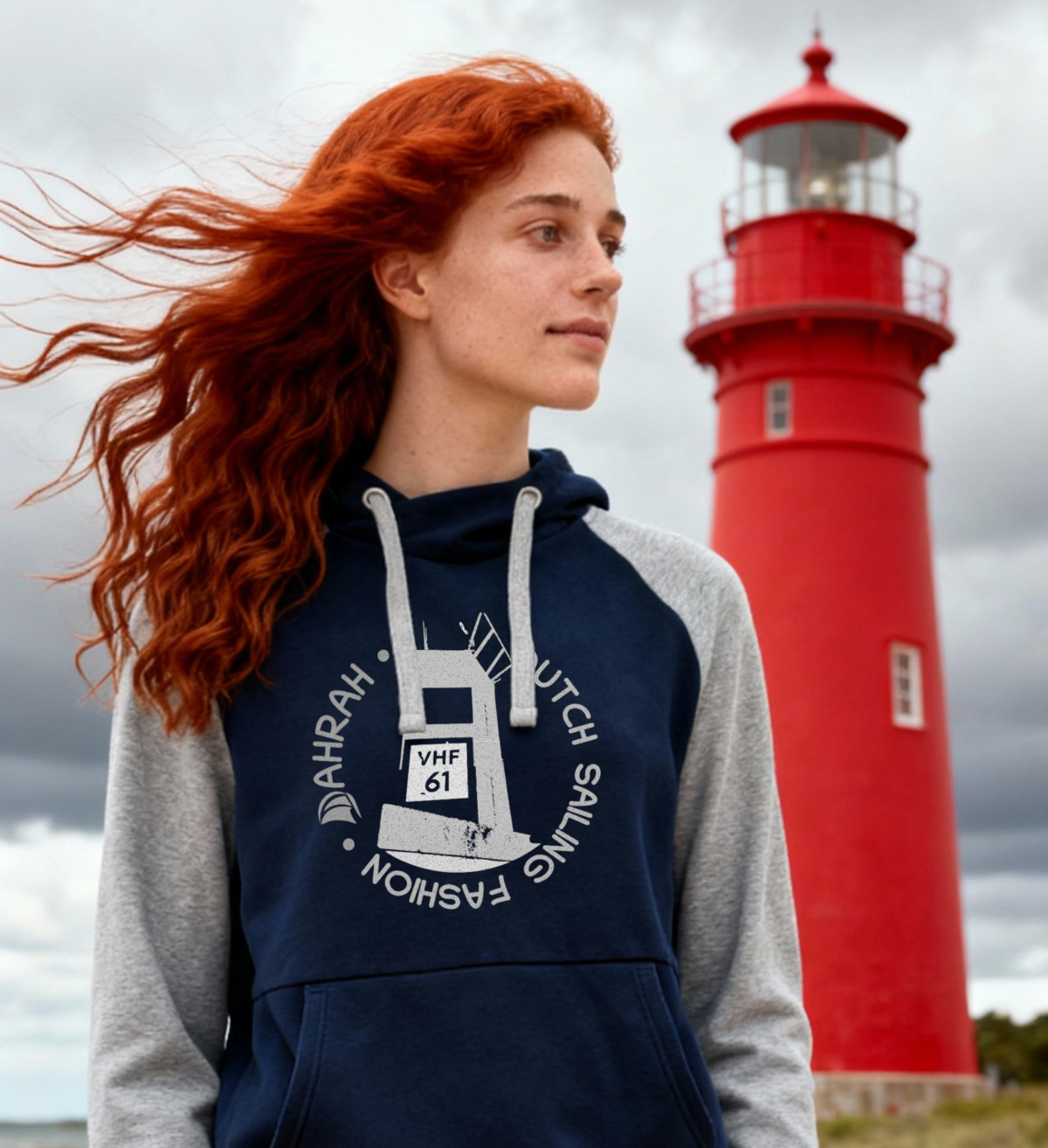 Sailing hoodie by Dahrah with print of a lighthouse, in grey and navy color and raglan sleeve. Great style for sailing, skippers and crews.
