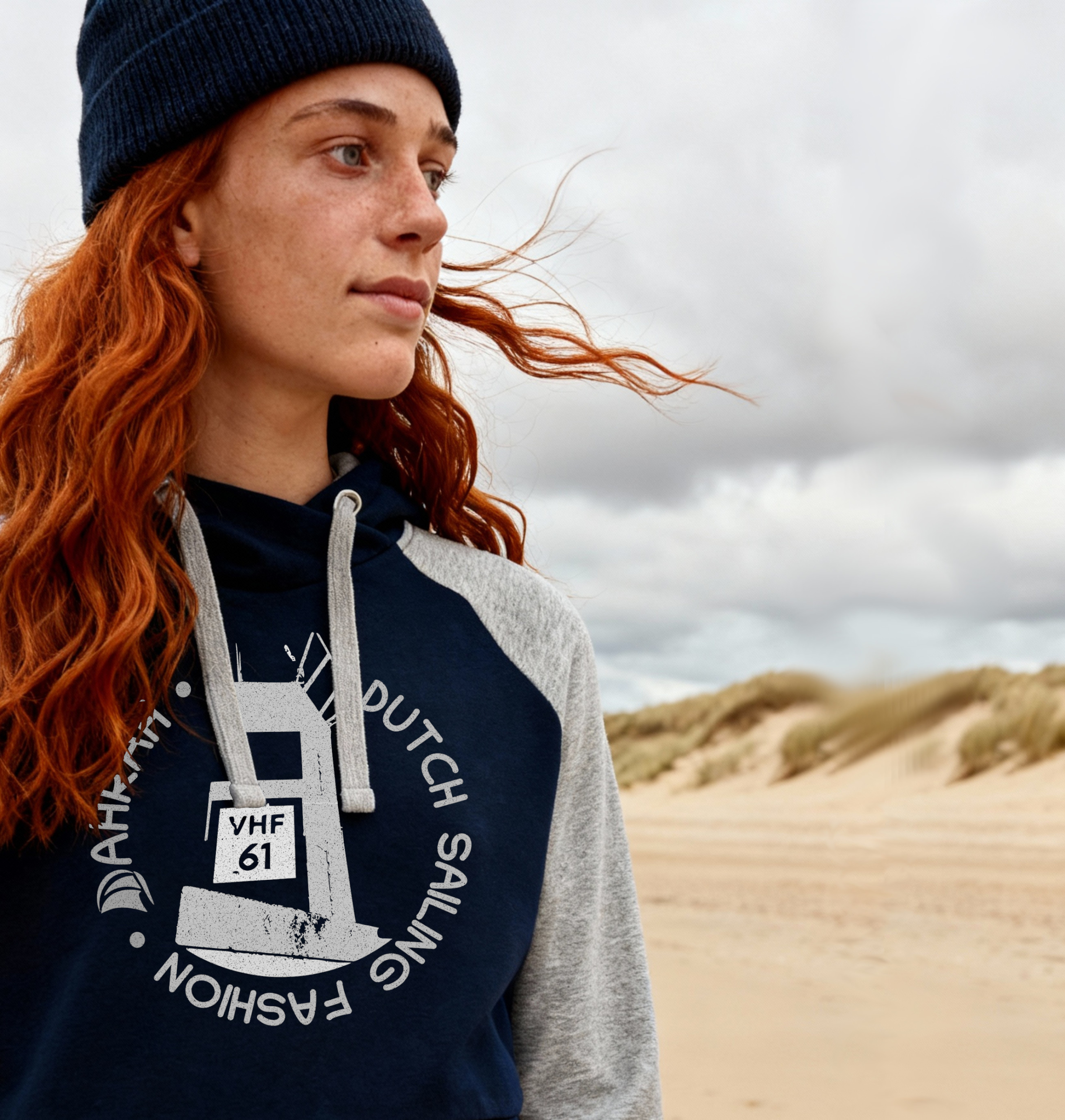 Sailing hoodie by Dahrah with print of a lighthouse, in grey and navy color and raglan sleeve. Great style for sailing, skippers and crews.