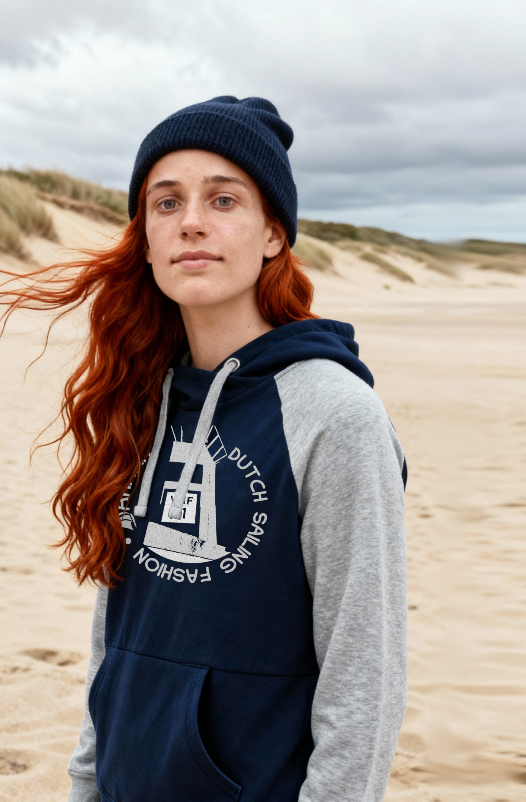 Sailing hoodie by Dahrah with print of a lighthouse, in grey and navy color and raglan sleeve. Great style for sailing, skippers and crews.