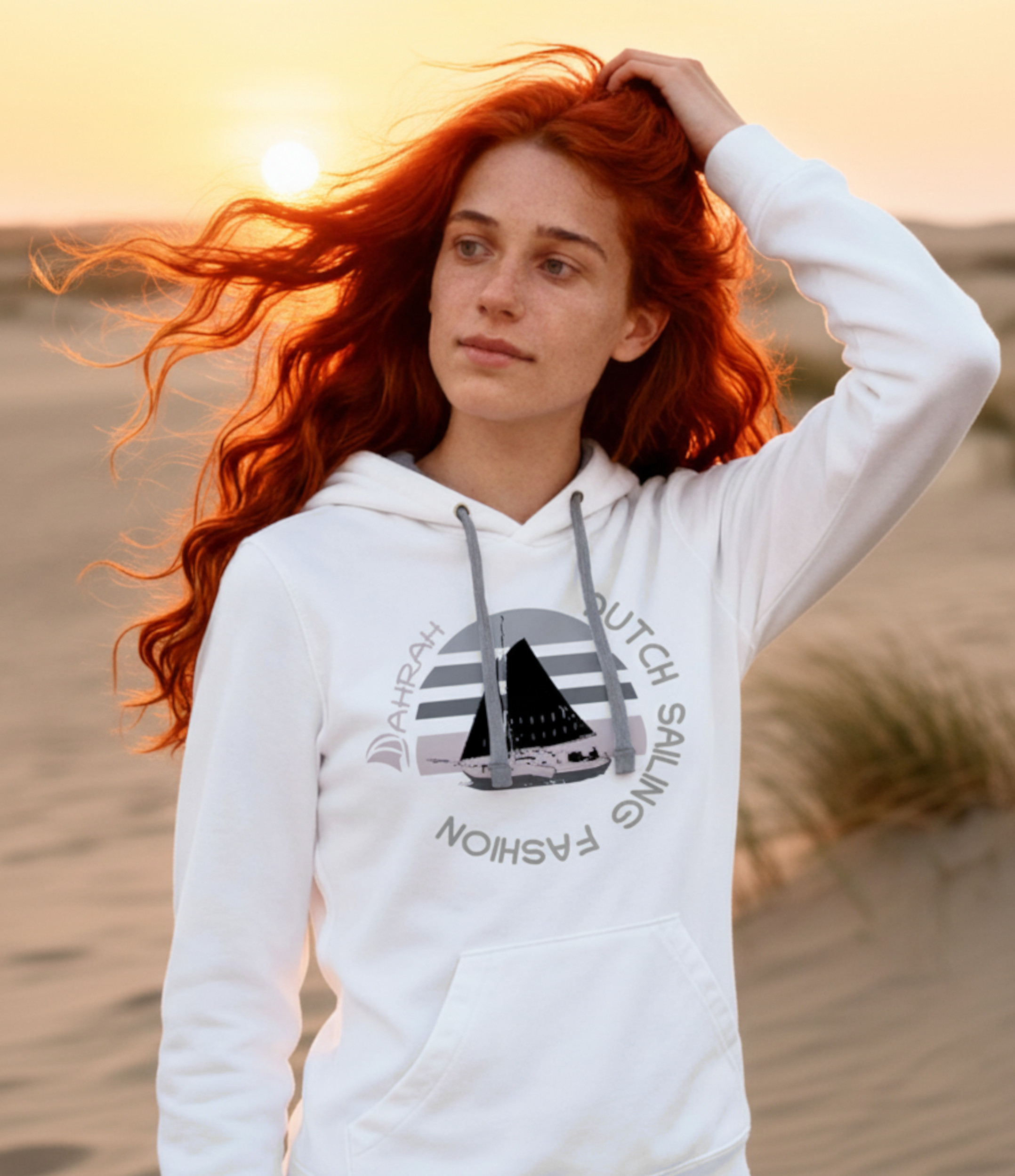 Unisex sailing hoodie with print of a Dutch traditional sailboat.