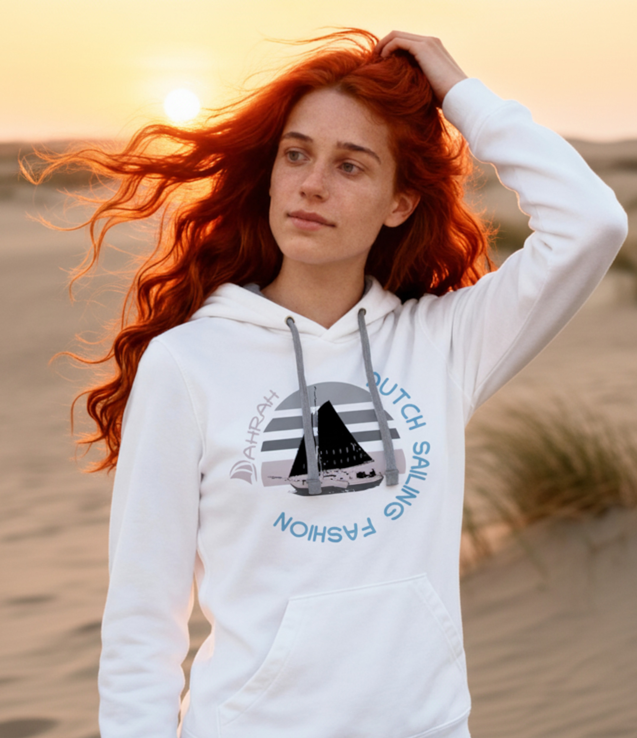 Unisex sailing hoodie with print of a Dutch traditional sailboat.