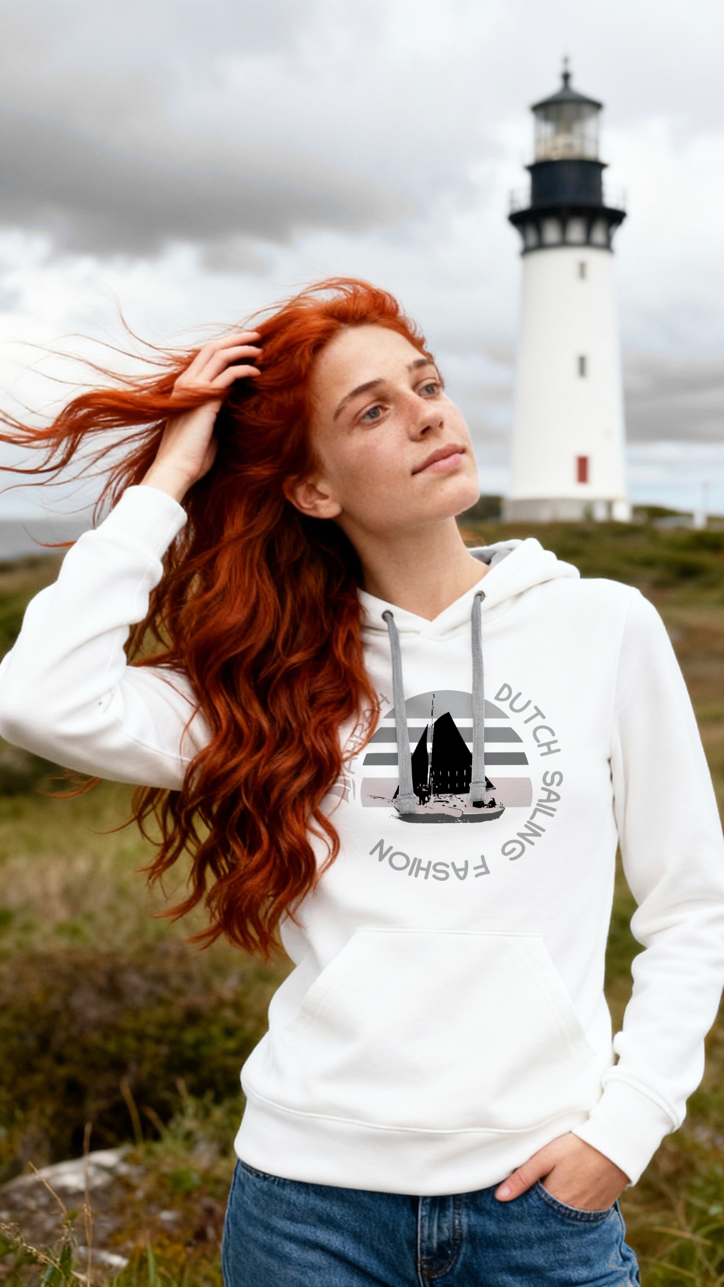 Unisex sailing hoodie with print of a Dutch traditional sailboat.