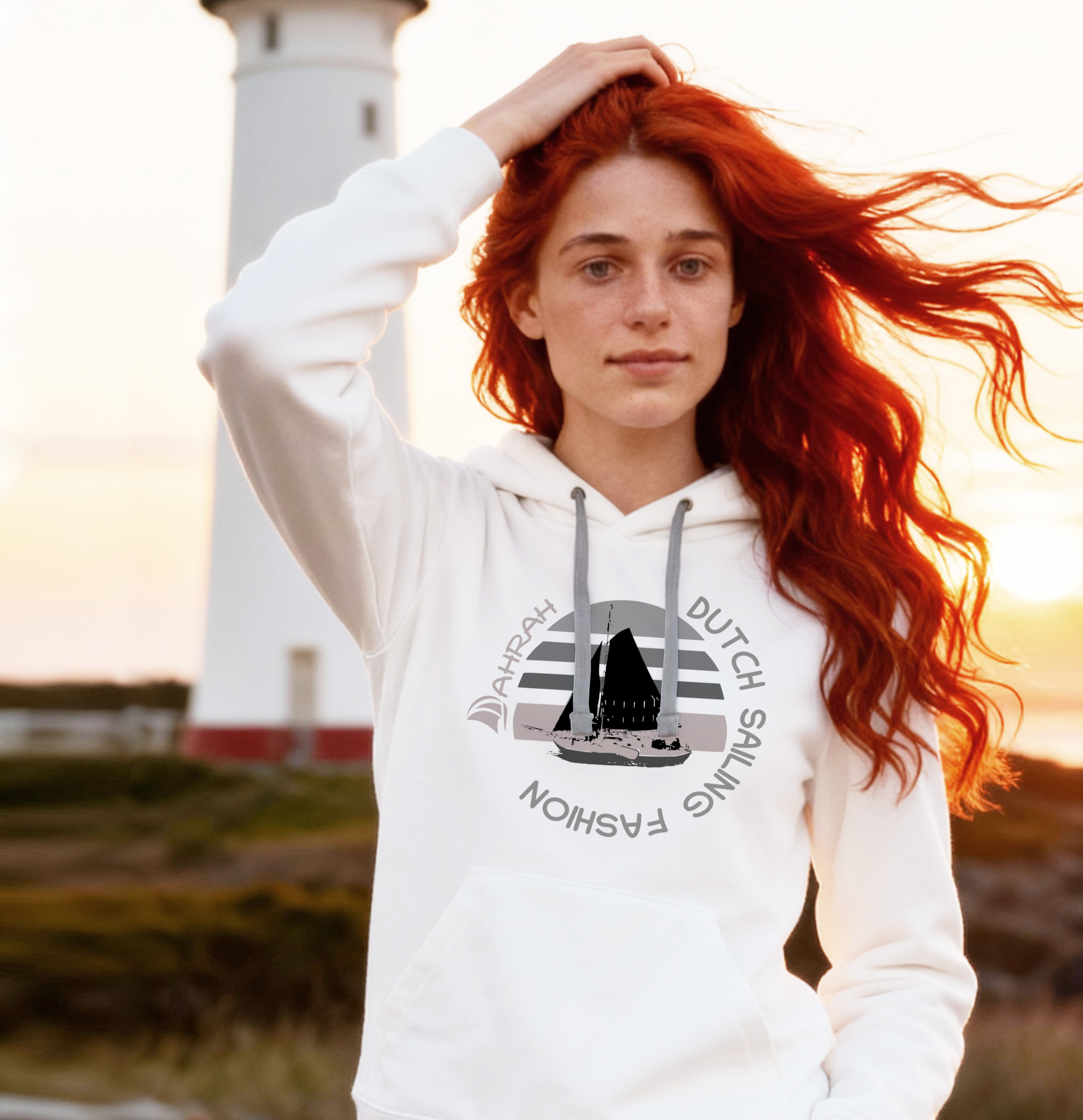 Unisex sailing hoodie with print of a Dutch traditional sailboat.