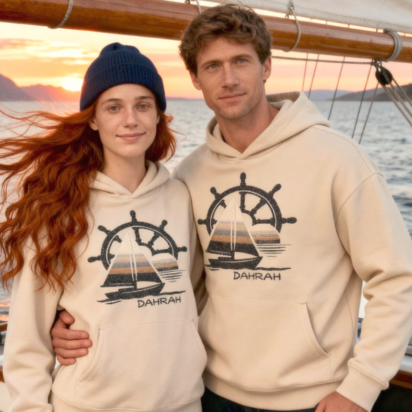 Skipper sailing hoodie with sailboat, boat helm and sunset.