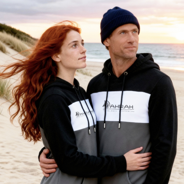Unisex sailing hoodie with sailboat logo in three colors, nautical style.