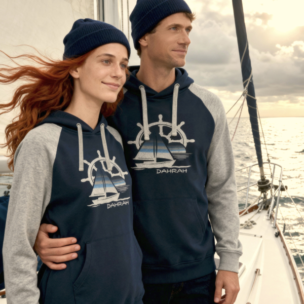 Sailboat hoodie with captain helm, sailboat and sunset by Dahrah, in grey and navy color and raglan sleeve.
