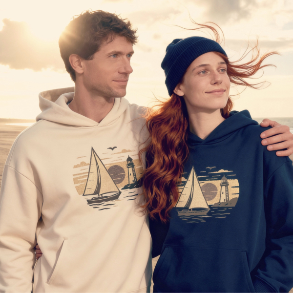 Vintage sailing hoodie with lighthouse and sailboat. Unique and creative design for adventurous sailors and crews by Dahrah Sailing Fashion.